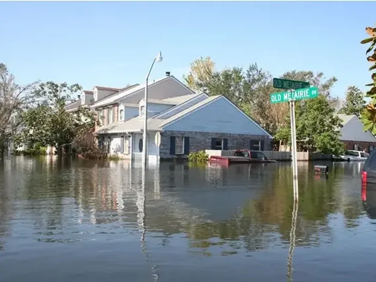Storm floodwater standing around a home after heavy rain